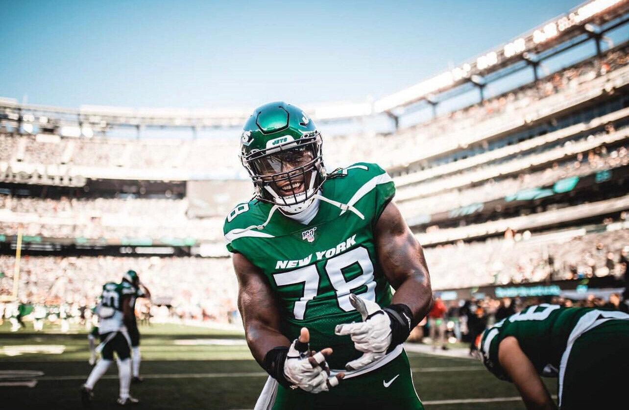 Jonotthan Harrison on the sideline at MetLife Stadium in a New York Jets #78 uniform